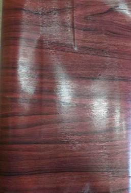 Plastica autoadesiva effetto legno mogano 101